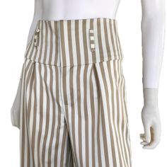 * Carmel Beige and Ivory Bengal Striped stretch polyester twill * High waist style * Belt loops on waist * Zipper closure in front * Wide leg design; option to wear cuffs rolled up Measurements: * Size 2 * Waist: 25-26 inches // Hips: 35-36 inches Inseam: 30 inches Luxury Striped Bottoms With Belt Loops, Luxury Striped High Waist Bottoms, Luxury Wide-leg Striped Bottoms, Luxury Wide-leg Pants With Vertical Stripes, Striped Stretch Wide-leg Pants, Striped Wide Leg Trousers, Womens Wide Leg Pants, Small Waist, Wide Leg Trousers