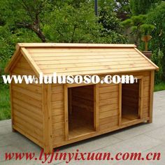 a wooden dog house with measurements for the roof and side walls, in front of some trees