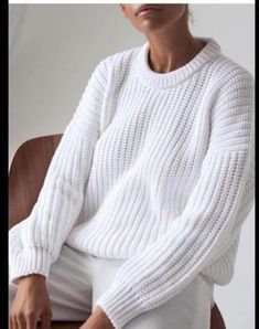 White sweater White Cozy Knitted Sweatshirt, White Knit Sweater For Winter, White Textured Knit Long Sleeve Sweater, Chic Crew Neck Sweater With Ribbed Cuffs, Chic White Crew Neck Cardigan, White Chic Crew Neck Cardigan, Winter White Long Sleeve Sweater For Winter, White Oversized Knitted Sweatshirt, White Chunky Knit Crew Neck Cardigan