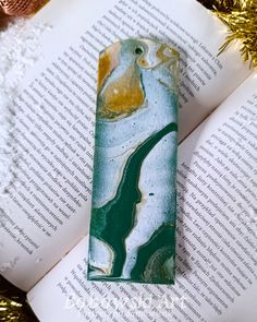 Hand-painted wooden bookmark.