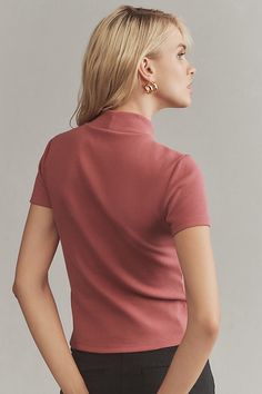 Inspired by the bestselling original, the mock-neck Blair features a classic slim cut and delicate ribbed texture. | Ribbed Mock-Neck Baby T-Shirt by Maeve in Pink, Women's, Size: 2XS, Cotton/Elastane at Anthropologie Pink Stretch Ribbed T-shirt, Fitted Pink Cotton Cropped T-shirt, Pink Stretch T-shirt With Scoop Neck, Pink Relaxed Fit Top With 3/4 Sleeves, Pink Organic Cotton Short Sleeve T-shirt, Cropped T Shirt, Ribbed Texture, Baby T Shirt, Crop Tshirt