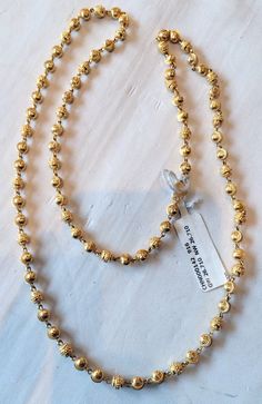 "22K Solid Gold (No filling ) Beads strand Necklace. Length-24\" , weight-26.710 grams." Gold Rondelle Beaded Necklace Single Strand, Gold Hand-strung Rondelle Jewelry, Spiritual Gold Jewelry With Single Strand, Spiritual Gold Jewelry Single Strand, Gold Rondelle Hand-strung Necklaces, Gold Rondelle Necklace With Spacer Beads, Gold Round Beaded Necklaces With Spacer Beads, Yellow Gold Hand-strung Beaded Necklaces, Yellow Gold Hand-strung Beaded Necklace