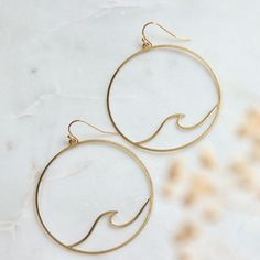 Wave Earrings Details: * MATERIAL: stainless steel ear wire, brass components * SIZE: 50mm Arrives with a branded jewelry card Trendy Round Brass Earrings, Wave Earrings, Trendy Hypoallergenic Brass Earrings, Trendy Brass Earrings For Gift, Jewelry Card, Ear Wire, Jewelry Earrings Hoops, Etsy Earrings, Hoop Earrings