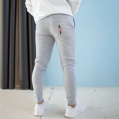 Upgrade your loungewear game with our premium quality fleece joggers. Made from the softest fleece material, these joggers will keep you warm and comfortable all day long. The tapered leg and elastic waistband provide a secure fit, making them perfect for running errands or lounging at home. Dress them up or down for any occasion and stand out with their sleek design. Don't miss out on ultimate comfort and style, add our luxurious fleece joggers to your wardrobe today! Premium fleece joggers, comfortable joggers, fleece joggers, premium quality, warm joggers, luxury fleece joggers, stylish joggers, versatile joggers, fleece pants, comfortable pants. .: 80% combed ringspun cotton, 20% polyester .: Medium-heavy fabric (8.2 oz /yd² (280 g/m .: 2 side pockets and back pocket .: Soft 3-end flee Jogging Style, Slim Fit Joggers, Staying Active, Stylish Fonts, Fleece Sweatpants, Grey Joggers, Black Fleece, Fleece Joggers, Charcoal Color