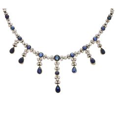 For Sale on 1stDibs - An extremely elegant late Victorian sapphire and diamond convertible tiara and earring set, in silver and gold, circa 1900’s. This beautifully handcrafted Elegant Jewelry With Rose Cut Diamonds And Sapphire, Fine Jewelry With Sapphire And Single Cut Diamonds, Exquisite Rose Cut Diamonds Jewelry For Evening, Evening Fine Jewelry With Rose Cut Diamonds, Fine Jewelry With Rose Cut Diamonds For Evening, Classic Teardrop Rose Cut Diamond Jewelry, Formal Sapphire Jewelry With Single Cut Diamonds, Evening Oval Rose Cut Diamond Jewelry, Oval Rose Cut Diamond Evening Jewelry