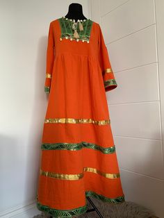 This is stunning vintage-style Afghan Dress is made from 100% cotton. The dress is suitable for all occasions. One size fits many as ,but it is most suited to medium body size. Dimensions: Shoulder: 39.5cm Length: 137cm Sleeve:51cm Waist size:98cm Bohemian Handloom Dress For Festivals, Bohemian Handloom Dresses For Festive Occasions, Fitted Bohemian Handloom Dresses, Cotton Handloom Dresses For Festivals, Festive Cotton Dress With Woven Motifs, Cotton Maxi Dress For Traditional Ceremonies, Cotton Anarkali Dress For Traditional Ceremonies, Cotton Folk Style Maxi Dress, Traditional Cotton Maxi Dress