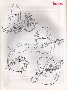 some type of embroidery design with flowers and leaves on it's side, including the letter