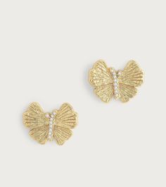 These hand sculpted butterfly studs are crafted in 18k gold dipped brass and accented with hand-set crystals. These beautiful and exquisitely made earrings are timeless addition to your everyday wardrobe. Add a touch of elegance and sparkle to your outfit with these hand-crafted butterfly studs. Made with 18k gold dipped brass and adorned with hand-set crystals, these earrings are a luxurious must-have for your everyday look. 18K Gold Plated Brass Crystal 0.7" L x 0.5" H Elegant Gold Earrings With Butterfly Charm, Elegant Gold Butterfly Earrings, Elegant Gold Butterfly-shaped Earrings, Gold Butterfly Earrings For Formal Occasions, Gold Earrings With Butterfly Charm For Formal Events, Gold Earrings With Butterfly Charm For Formal Occasion, Gold Cubic Zirconia Butterfly Earrings, Butterfly Shaped Earrings With Diamond Accents, Gold Earrings With Butterfly Charm For Anniversary