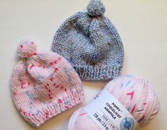 three knitted hats sitting next to each other