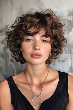 One of the biggest benefits of perms for short hair is the added volume. Short hair can sometimes fall flat, but with a perm, you get natural-looking curls that give your hair a fuller. Cold Wave Perm Short Hair, Short Permed Hairstyles With Bangs, Short Curly Round Haircuts, Retro Short Curly Hair, Curly Perm Short Hair, Wavey Hair Styles Short Natural, Loose Curl Perm Short Hair, Perm Short Hair Girl, Loose Spiral Perm Short Hair