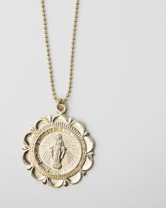 This beautiful necklace features an iconic image of the Roman Catholic icon, the Virgin Mary. *Material: 14k Gold filled chain and clasp with Round Virgin Mary Charm in 14K gold filled ■ MEASUREMENTS: Round disc charm measures approx. 23mm in diameter. 1mm beads chain. # Beautiful Virgin Mary Pendant Mother Mary Catholic Necklace Christian pendant necklace Pray Virgin Mary Gold filled necklace Sterling silver necklace ■ SHIPPING UPGRADES You can find shipping upgrades options in the drop bar men Virgin Mary Pendant, Mary Necklace, Catholic Necklace, Virgin Mary Necklace, The Virgin Mary, Gold Ring Designs, Bead Chain, Roman Catholic, Beautiful Necklace