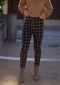 Experience the perfect combination of sophistication and style with our Tartan Tempo Pants. Featuring a plaid pattern and a stretchy elastic waistband, these high waisted pants will keep you looking sharp and feeling comfortable all season long--perfect for dinner, drinks, and even Christmas parties! Soft, stretchy knit fabric allows for a chic, elevated look that's both professional and cozy. Enjoy a touch of elegance with Tartan Tempo Pants. Fabric 95% Polyester, 5% Spandex Machine wash cold. Plaid Pants Outfit, Tartan Pants, Plaid Leggings, Dinner Drinks, Pants Fabric, Christmas Parties, Plaid Pants, Pants Outfit, Plaid Pattern