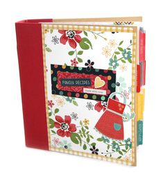 a red and white binder with flowers on it