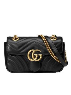 GG Marmont Mini Colour: Black Calfskin Leather Sliding chain strap Antique gold-toned hardware Double G Matelassé chevron with a heart Internal open pocket Flap with spring closure Style ID: 446744 DTDIT 1000 Dust bag & Care card Made in Italy    Measurements:   Width: 22cm x Height: 13cm x Depth: 6cm Shoulder strap with 55cm drop or can be worn as a top handle with 30cm drop * There may be a slight difference in the tone of colours depending on the resolution of your monitor. * Do note that there may be a 1-2cm difference in measurements depending on how the item is measured and workmanship. Gucci Dyonisus Bag, Gucci Marmont Belt, Gucci Marmont Bag, Gucci Mini, Gucci Crossbody Bag, Gucci Purse, Gucci Crossbody, Gucci Marmont, Gucci Gg Marmont