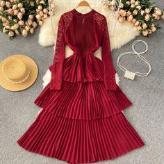 Step into a world of bohemian elegance with this stunning burgundy pleated lace dress. The intricate lace detailing on the sleeves and neckline evokes a romantic and ethereal feel, perfect for any free-spirited fashionista. The high neckline and long sleeves provide a sophisticated silhouette, while the delicate lace offers a sheer, tantalizing glimpse of skin beneath.At the waist, a gathered detail creates a flattering shape before the dress cascades into a series of pleated tiers, each one dan Sweetheart Evening Dress, Lace Long Sleeve Dress, Lace Decor, Lace Long Sleeve, Long Sleeve Lace Dress, Chiffon Lace, Khaki Green, Sheer Lace, Purple Black