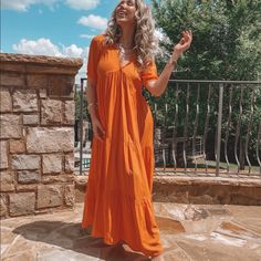 Add Some Color To Your Vacay Wardrobe With This Oversized Italian Made Maxi Dress From Dixie Brand. Featuring An Orange Material, Teared Skirt And Oversized Fit. Just Add Some Gold Jewlery, Strappy Sandals, And A Cute Tote For The Ultimate Summer Look! Recommended To Size Down. Runs On The Larger Side. V-neck Maxi Dress For Daytime, Casual Orange Maxi Dress With Short Sleeves, Casual Orange Short Sleeve Maxi Dress, Orange V-neck Maxi Dress For Daywear, Orange Tiered Maxi Dress For Beach, Orange Short Sleeve Maxi Dress For Brunch, Casual Orange Flowy Maxi Dress, Relaxed Fit V-neck Maxi Dress For Brunch, V-neck Maxi Dress For Brunch