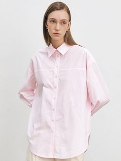 This is HACIE’s oversized shirt is made with premium cotton material in a cheerful color. It features decorative stitching in the shape of a chest pocket for added flair. The double-layered cuffs allow for various styling options depending on the button placement. Finished with a round hem, it also includes natural round-cut details on the back yoke line.- It's a great item for daily wear- It can be styled with different bottoms to create various looks- The brand's signature logo embroidery adds a design focal point Oversized Shirt With Button Cuffs For Spring, Oversized Pink Blouse With Pockets, Oversized Pink Shirt With Pockets, Oversized Spring Shirt With Cuffed Sleeves, Shirt Yoke, Double Cuff, Oversize Shirt, Decorative Stitching, Logo Embroidery