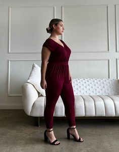 The Curve Knit Sleeveless Jumpsuit is perfect for a night out with friends or a date night. Pair this plus size jumpsuit with a leather jacket and some heels for an edgy look, or make it a bit more casual with a jean jacket. This jumpsuit features two hip pockets, long sleeves, ruching at the waist and ankles, and surpliced, v-shaped necklines in both the front and the back. It is a step-in jumpsuit, with no zippers or buttons. The material is a stretchy knit. This jumpsuit is made from 96% rayo Non-stretch V-neck Jumpsuits And Rompers For Night Out, V-neck Non-stretch Jumpsuits And Rompers For Night Out, Non-stretch V-neck Jumpsuit For Night Out, V-neck Non-stretch Jumpsuits For Night Out, Trendy Solid Color Jumpsuits And Rompers For Date Night, Trendy Solid Jumpsuits And Rompers For Date Night, Elegant Sleeveless Jumpsuits And Rompers For Fall, Versatile Fitted Jumpsuits And Rompers For Night Out, Stretch Jumpsuits And Rompers For Date Night In Fall