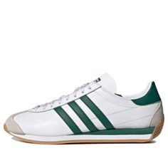 Adidas Leather Sneakers For Outdoor, Adidas Logo Leather Sneakers For Outdoor, Retro Sneakers With Three Stripes And Round Toe, Classic White Sneakers With Three Stripes Branding, Adidas Retro Sneakers With Cushioned Footbed, Retro Outdoor Sneakers With Rubber Sole, Classic Outdoor Sneakers, Vintage White Sneakers With Cushioned Footbed, White Adidas Sneakers For Outdoor Activities