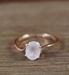 Delicate Oval Rose Gold Jewelry, Rose Gold Rose Quartz Jewelry For Anniversary, Oval Rose Gold Moonstone Ring, Rose Gold Oval Moonstone Ring, Rose Gemstone Jewelry For Anniversary, Rose Gold Oval Cabochon Jewelry For Anniversary, Rose Gold Oval Cabochon Jewelry For Wedding, Elegant Oval Rose Quartz Rings, Handmade Gemstone Jewelry