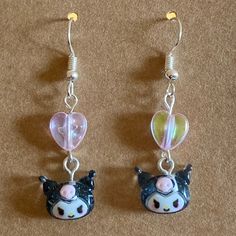 Sanrio Kuromi Heart Earrings Dangle/Drop Style Earrings With Acrylic Kuromi And Heart Charms. Kuromi Charm Has Glitter Inside And Heart Charm Has Iridescent Sheen. Product Info Handmade By Me Measures About 1.8 Inches In Length Made With Acrylic/Plastic Charms And Silver-Colored Metal Earring Hooks Includes Rubber Earring Backings And Packaged With Display Card All New Materials Ready To Ship From Los Angeles, Ca Caution: Contains Small Parts That May Be A Choking Hazard To Small Children And Pe Kuromi Heart, Weird Earrings, Plastic Charms, Sanrio Kuromi, Acrylic Plastic, Earring Hooks, Metal Earrings, Display Cards, Style Earrings