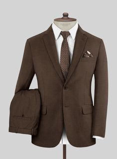 Simple but effective, the Worsted Brown Wool Suit offers an on-trend take on classic dressing. Crafted from a wool blend, the fabric comes with a brown hue that will help you focus on the special moments and be a great addition to your wardrobe.   Look Includes  Worsted Brown Wool Fabric  Two Button Jacket Style  Notch Lapel  Horn Brown Buttons  Single Vent  Three Cuff Buttons  Two Welted Pocket on Trousers   You can change the look during customization if required.  Lining: Viscose; Dry Clean. Elegant Brown Outerwear With Notch Lapel, Brown Wool Suit With Welt Pockets, Classic Brown Suit With Long Sleeves, Timeless Brown Suit For Fall, Fitted Brown Blazer With Welt Pockets, Classic Brown Long Sleeve Suits, Tailored Brown Wool Suit, Brown Wool Suits With Suit Collar, Tailored Brown Blazer