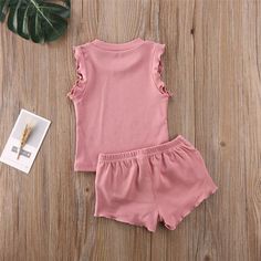 Product Title: Baby Girls Solid Color Sleeveless Top & Shorts Baby clothesKeyword Tag: Linen Baby Clothes Wholesale*Soft Feeling & Cozy Comfortable*Package Package Included:1Top+1Shorts*Fabric & Fabric: Cotton,Polyester*Available for Machine Wash as well as TumbleDry*imported Cute Pink Cotton Short Set, Cute Sleeveless Loungewear Sets, Cute Sleeveless Solid Color Sets, Cute Solid Color Summer Sets, Cute Solid Color Sleeveless Sets, Sleeveless Cotton Short Set For Spring, Pink Short Set For Summer Playwear, Pink Short Set For Playwear, Stretch Cotton Sleeveless Sets