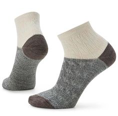 If you're looking for a comfortable sock for your favorite pair of ankle boots, look no further. The Women's Everyday Cable Ankle Boot Socks is the perfect addition to any boot. With a Virtually Seamless toe for enhanced comfort and a slim fit for less bulk, you'll never wear another ankle sock again. Sock Height: Ankle Sock Cushion: Zero Cushion Virtually Seamless™ toe for enhanced comfort Made in the USA 71% Merino Wool 10% Nylon 18% Recycled Nylon 1% Elastane *Specific percentage of Recycled Smartwool Socks, Ankle Sock, Comfortable Socks, Wool Clothing, Athletic Socks, Boot Socks, Ankle Socks, Black Print, Socks Women