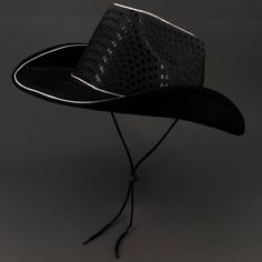 Black color is liked by all and you are sure to find a lot of accessories in black color however they are not as cool as the EL wire cowboy / cowgirl hats in black color. The lighted hats come with contrasting EL wire and black colored sequins which ensure that the glow in the dark hats are visible even from a distance and you are able to stand out in a crowd. The trendy, funny, crazy & cute sequined cowboy / cowgirl hat is unisex and comfortable to wear and you can make the best of the products Glow Cowboy Hat, Black And Silver Cowboy Hat, Light Up Cowboy Hat, Black Rhinestone Cowboy Hat, Cowboy Hat Cheap Black, Led Necklaces, Glow Bracelets, Led Balloons, Led Shoes