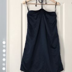 New Navy Satin Halter Dress From The Gap. Features Pleats On Front Neckline And A Braided Halter Strap. Photo Was Taken With Bra Straps Showing On Hanger. Back Has Elastic To Help Hold Dress Up. Unlined. Sfpf Home. Navy Mini Dress For Summer, Navy Knee-length Mini Dress For Summer, Chic Summer Midi Dress By Gap, Gap Summer Mini Dress, Chic Summer Gap Midi Dress, Navy Mini Dress For Summer Night Out, Navy Evening Dress For Summer, Sleeveless Mini Dress By Gap, Gap Midi Beach Dress