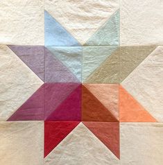 an image of a quilt made with different colors