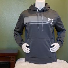 A Classic Under Armour Logo Accents The Chest Of This Long Sleeve Hoodie That Is Perfect For Layering. Fit: This Style Fits True To Size. - Attached Hood With Drawstring - Long Sleeves - Kangaroo Pocket - Logo Print - Woven Construction - Approx. 29" Length - Imported Under Armour Hooded Sweatshirt For Sports, Under Armour Winter Sports Sweatshirt, Under Armour Hooded Sweatshirt For Streetwear, Hooded Under Armour Sweatshirt For Streetwear, Under Armour Hoodie Sweatshirt For Fall, Under Armour Hoodie For Winter Sports, Under Armour Sports Hoodie For Winter, Under Armour Sports Sweatshirt For Fall, Under Armour Winter Sports Hoodie