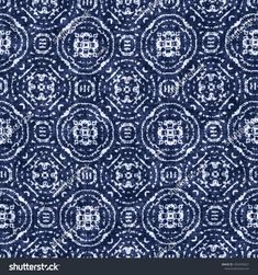 a blue and white pattern on fabric