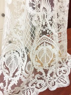 Couture Lace Fabric by yard in Off White Retro Floral Bridal | Etsy White Floor-length Gown With Delicate Lace, Floor-length Lace Dress With Lace Trim, White Embroidered Fabric With Lace Trim For Ceremonies, Elegant Cream Lace Tulle Fabric, Floor-length Lace Gown With Lace Patchwork, Floor-length Lace Gown With Lace Trim, Elegant Lace Embroidered Gown, Floor-length Lace Gown With Scalloped Lace, Floor-length Lace Gown With Scalloped Detail