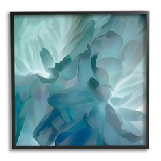 an abstract photograph of blue flowers with white petals in the center and green leaves on the bottom