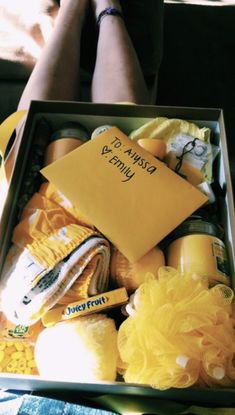 a box filled with lots of yellow items