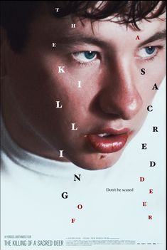 a movie poster for the killing of a sacred deer with an image of a man's face