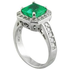 Stamped: 14K Total Ring Weight: 7 Grams Emerald Weight 2.10 Carat (7.80x7.50 Millimeters)Diamond Weight: 0.75 carat (F-G Color, VS2-SI1 Clarity )Face Measures: 12.05x11.85 Millimeter SKU: [600420] Classic Princess Cut Emerald Ring With Halo Setting, Classic Emerald Princess Cut Diamond Ring, Elegant Gia Certified Princess Cut Emerald Ring, Classic Princess Cut Emerald Diamond Ring, Classic Gia Certified Emerald Diamond Ring, Classic Emerald Ring With Asscher Cut Halo, Classic Platinum Emerald Ring With Center Stone, Heirloom Emerald Ring With Gia Certification, Classic Asscher Cut Emerald Ring In Platinum