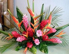 a vase filled with flowers on top of a table