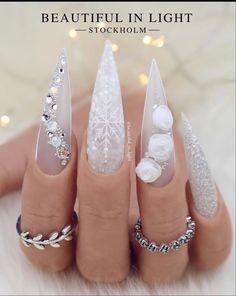 Winter Bling Nails, Winter Stiletto Nails Designs, Classy Christmas Nails Acrylic, Winter Nails Stiletto, Christmas Nails With Rhinestones, Stiletto Nails Christmas, Winter Stiletto Nails, Stiletto Christmas Nails, Nails Ideas For Winter