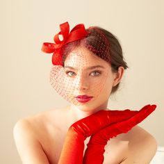 The fascinator and veil in rich  poppy red colour has simple, understated design, yet it is  a striking headpiece for a wedding guest or bridesmaid. Elevate your style with a touch of minimalist charm and understated elegance. This accessory effortlessly provides the essence of femininity, making it the perfect choice for those seeking refined sophistication. Pictured in poppy red. Available in various colours, please, see pictures and colour option menu. The bow headpiece features a unique desi Red Fascinator For Wedding At Royal Ascot, Red Fascinator For Kentucky Derby Wedding, Red Fascinator For Wedding At Kentucky Derby, Red Fascinator For Kentucky Derby Gift, Red Headpieces For Summer Gifts, Red Headpieces As Summer Gifts, Red Headpieces Suitable For Summer Gifts, Red Wedding Fascinator, Red Spring Wedding Fascinator