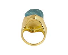 With its striking elegance and earthy sophistication, this Ten Thousand Things ring is a modern classic. The large, asymmetrically faceted bright blue aquamarine is set in closed back setting of 18K yellow gold and is centered on the polished, 18K yellow gold band. No matter which finger you wear it on, this ring exudes a casual, bohemian vibe.aquamarine : 20mm x 15mm x 10mm deep18K yellow gold band width : 2.5mm to 4mmsize available : 6.75please contact us for sizing options Luxury Gold Aquamarine Rings, Modern Gold Rings With Blue Topaz, Modern Blue Faceted Rings, Sevan Bicakci, Alice Cicolini, Jennie Kwon, Maria Tash, Zoe Chicco, Cathy Waterman