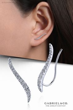 Smoothly curved and tapered 14k white gold climber earrings adorned with 0.23cts of shimmering French pavé diamonds make a striking and stylish accessory. This trendy ear climber style is a modern way to flaunt diamond earrings for day or night. EG12939W45JJ #GabrielNY #DiamondJewelry #FineJewelry #GabrielAndCo #UniqueJewelry #Jewelry #FashionJewelry #GiftIdeas #UniqueGifts #Earrings #FashionEarrings #WhiteGoldEarrings #WhiteGoldFashionEarrings #GoldEarrings #GoldFashionEarrings #Graduations #Gr Earrings Fine Jewelry, Chain Ring Gold, Crawler Earrings, Desain Pantry, Womens Jewelry Trends, Gold Bridal Necklace, Ear Crawler, Art Jewelry Design, Mens Rings Fashion