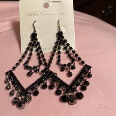 Kiloo Ornaments, Vintage Black Dangling Earrings, Gorgeous Black Drop Earrings For Evening, Elegant Black Hoop Earrings As Gift, Adjustable Pierced Earrings For Parties, Elegant Black Chandelier Earrings For Party, Black Dangle Chandelier Earrings For Party, Black Metal Jewelry For Party, Black Chandelier Drop Earrings For Evening, Black Metal Party Jewelry, Elegant Black Crystal Earrings For Evening