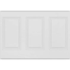 a white paneled wall with three doors