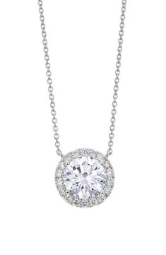 This stunning necklace is crafted with a center lab-grown-diamond pendant that's haloed by sparkling pavé stones and suspended from a delicate chain. 16" length; 2" extender; 3/8" pendant diameter   Total lab-grown-diamond weight: 2ct.   Color: G–J   Clarity: VS   14k gold/lab-grown diamond   Imported   >Diamond Guide Dazzling Lab Grown Diamond Round Pendant Necklace, Timeless Lab Grown Diamond Halo Jewelry, Dazzling Moissanite Halo Jewelry, Dazzling Lab-grown Diamond Round Pendant Necklace, Dazzling Round Pendant Necklace With Lab Grown Diamond, Round Lab Grown Diamond Jewelry With Halo, Round Lab-grown Diamond Jewelry With Halo, Timeless White Gold Necklace With Halo Setting, Elegant Halo Lab Grown Diamond Jewelry