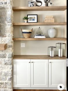 the shelves in this living room are made out of wood