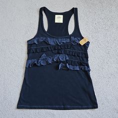 Size L Dark Navy Blue Color Brand New-Never Worn Measurements: Pit To Pit 16" Length 27" Dark Navy Blue Color, Hollister Tank Tops, Hollister Tops, Navy Blue Color, Dark Navy Blue, Dark Navy, Hollister, Color Blue, Navy Blue