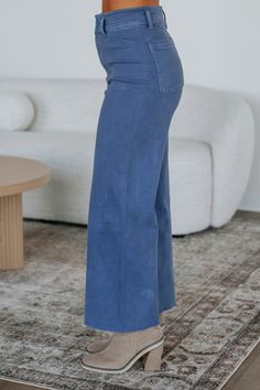 Details: Linsley Wide Leg Pants High Rise Zip Fly Button Closure Wide Leg Denim Material Minimal Stretch Raw Edge Frayed Hems Available in Multiple Colors Rise: 12" Inseam: 28" Material: 98% Cotton and 2% Spandex We are recommending: Small - Sizes (24-25) Medium - Sizes (26-27) Large - Sizes (28-29) Athleisure Shorts, Curvy Jeans, Denim Material, Shoes With Jeans, Blue Pants, Wide Leg Denim, Slate Blue, Cardigan Jacket, Raw Edge