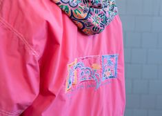 "Very comfy and lightweight vintage 90's pink windbreaker jacket with hood and multicolor floral pattern detailing. Features zipper and snap button fastening, drawstring at the hood and bottom hem, 2 flap pockets and 2 side entry pockets at the chest. Hood can be hidden in the collar. This jacket is perfect for festivals, streets or basically everywhere where you want to feel comfy and still look good. In very good vintage condition, steamed and ready to wear. MODEL is 5'5 ft (1,67 m) tall, size Pink Outdoor Windbreaker With Adjustable Hood, Retro Pink Hooded Outerwear, Vintage Hooded Spring Windbreaker, 90s Pink Windbreaker For Streetwear, Pink Retro Hooded Windbreaker, Pink Windbreaker, Suede Jacket Women, Leather Coat Womens, Longline Jacket